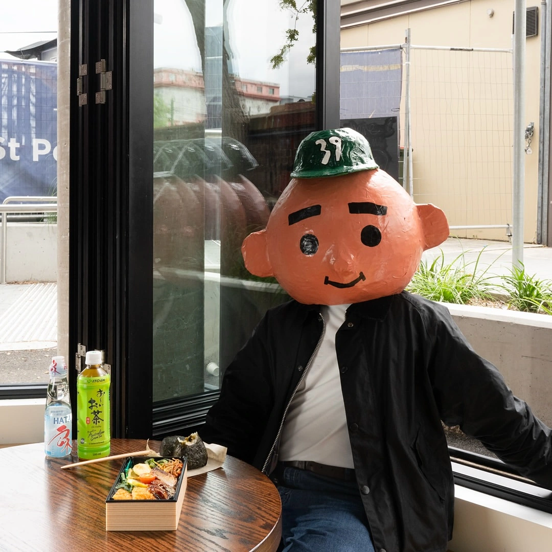 The Domo39 onigiri café character, a distinctive brand mascot.